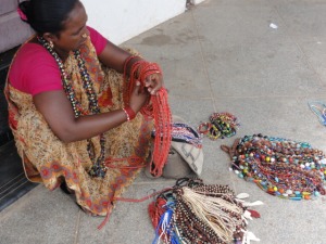 Trying to arrange beads of hard work for a necklace of survival.